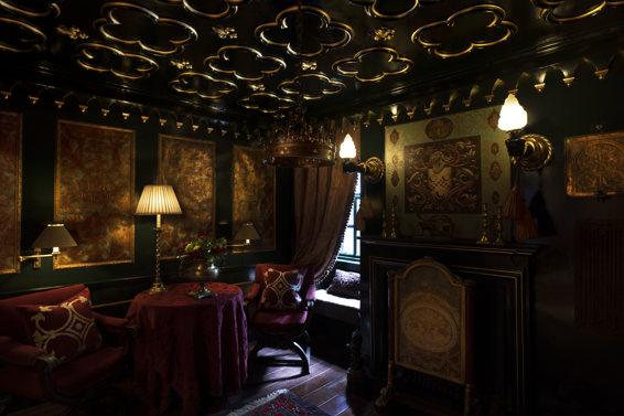 The Sempill: A luxury suite featuring antique furnishings and plush interiors